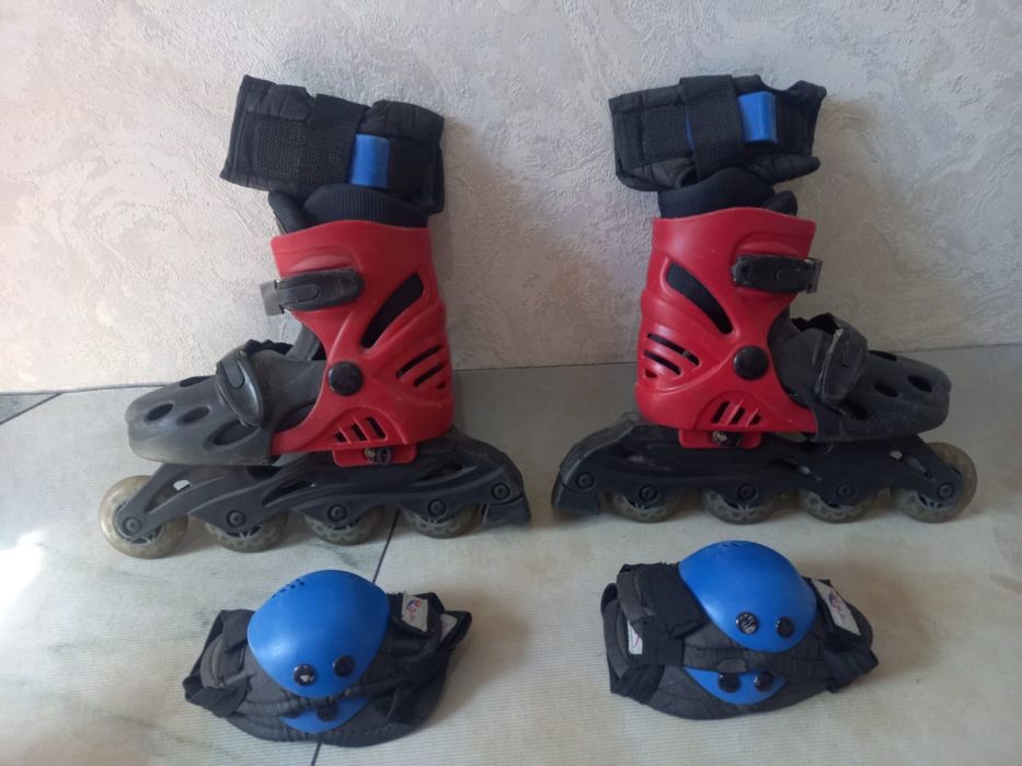 Роликовые коньки