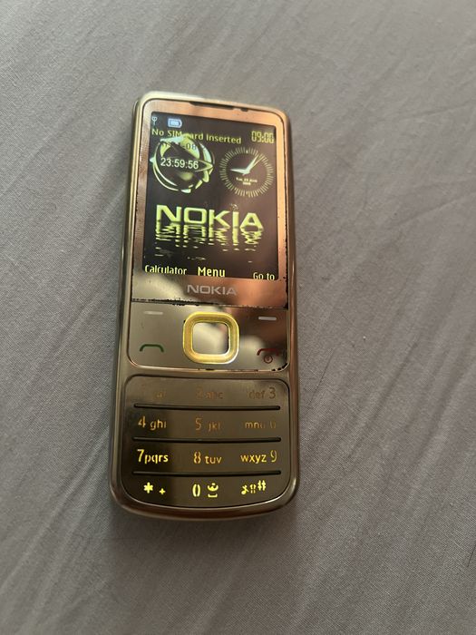 Vand Nokia 6700 gold
