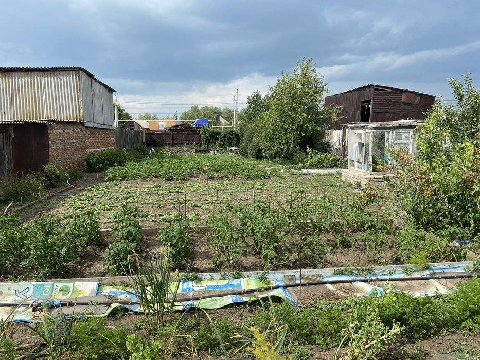 Четырехкомнатный дом в черте города