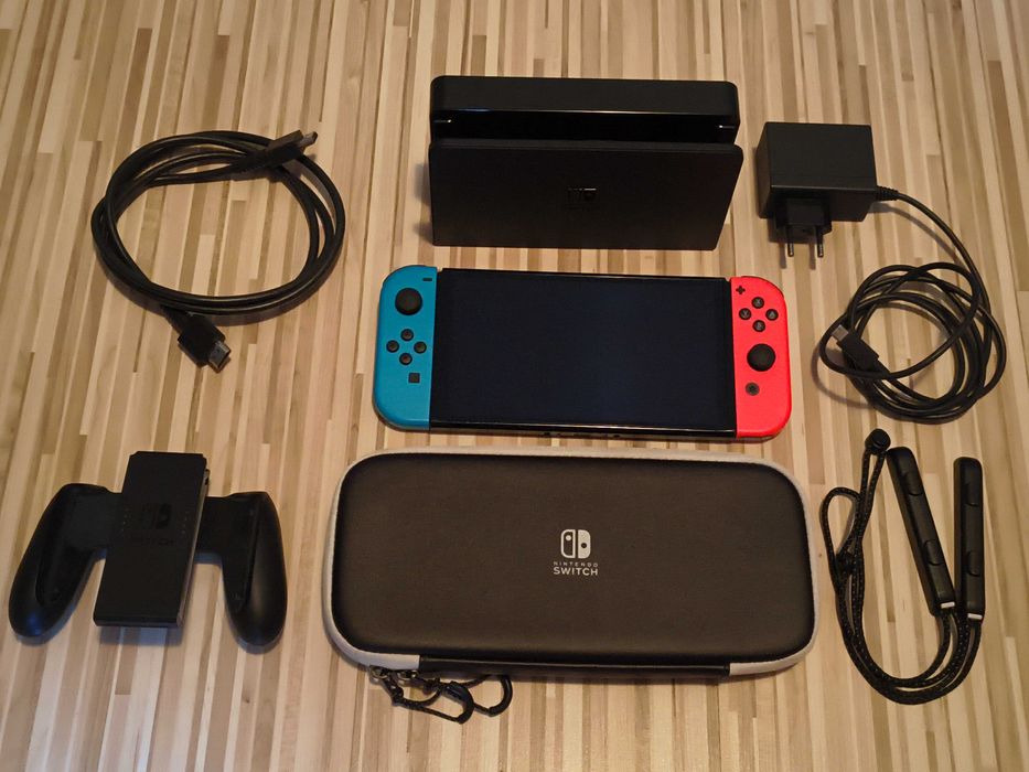 Nintendo Switch OLED la cutie modat card 128GB cu jocuri + husa