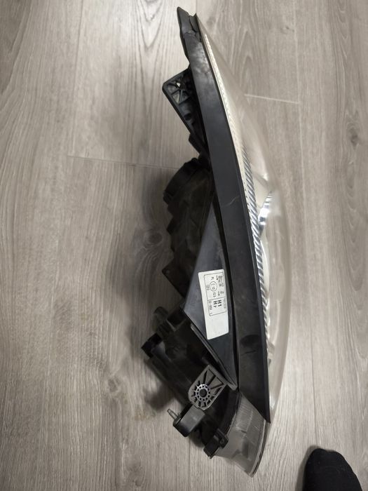 Far stânga față Kia Ceed 2006-2009