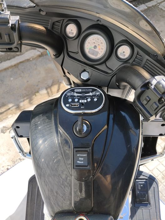 Детский трёхколёсный электромоцикл