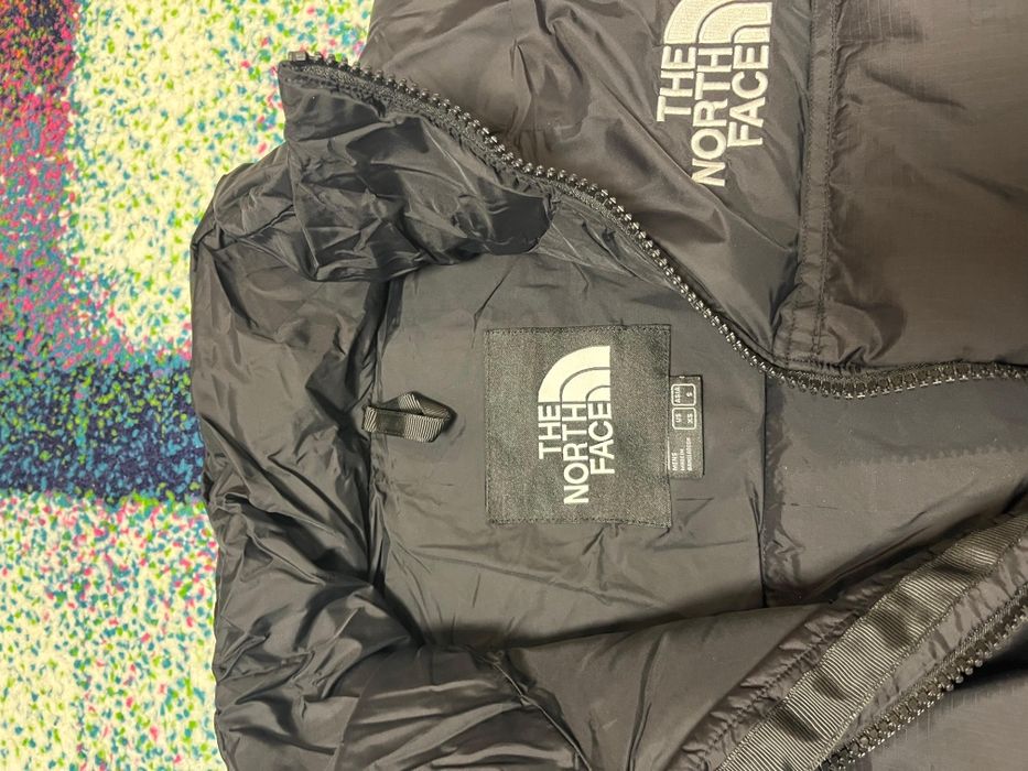Vând geaca north face