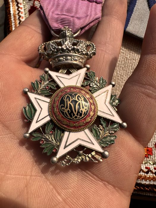 Медали Ордени СССР и Белгия Леополд сребро.