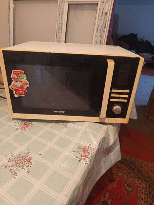 Продам микроволновую печь Nikai. б у