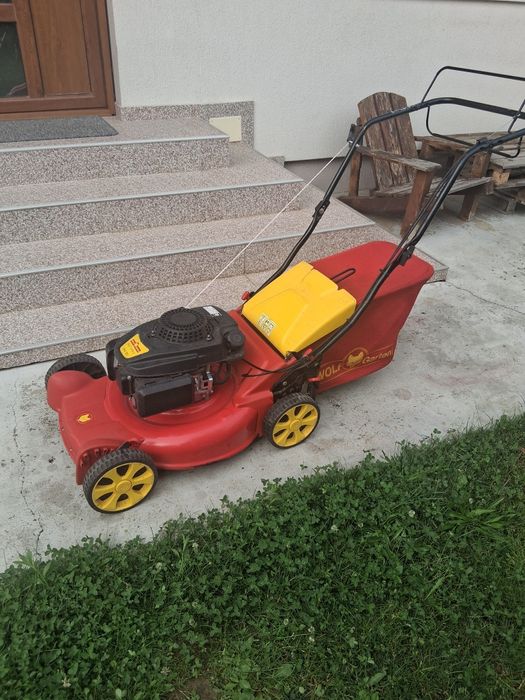Vând mașină de tuns gazon Wolf Garden pe benzină.