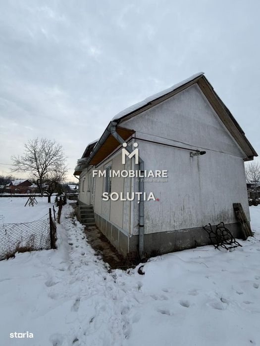 Casă cu teren generos în Buciumi
