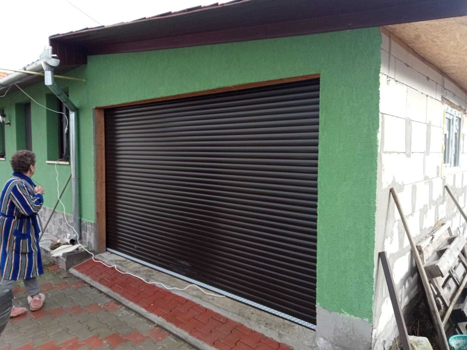 Usi garaj rulou=actionare electrica