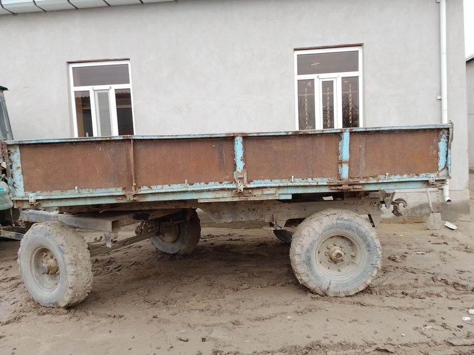 Traktor  2003 yil 50 million pasporti bor pitnak shahar