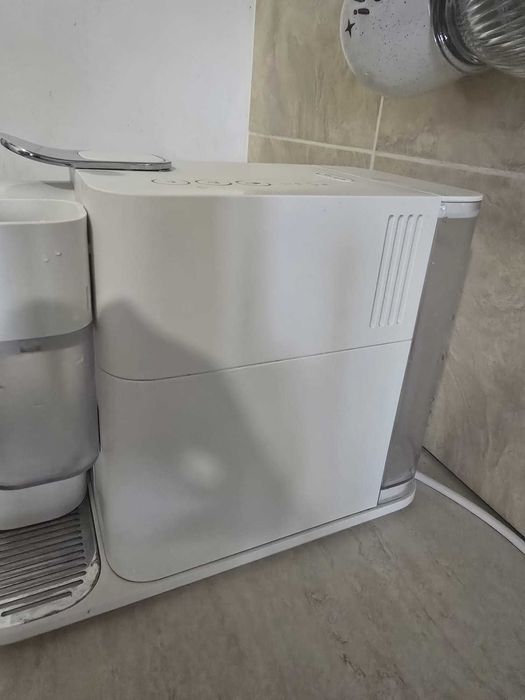 Expressor capsule Nespresso Lattissima Evolution