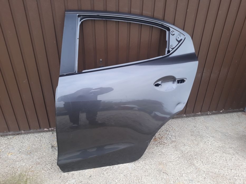 Usa stanga spate mazda 2