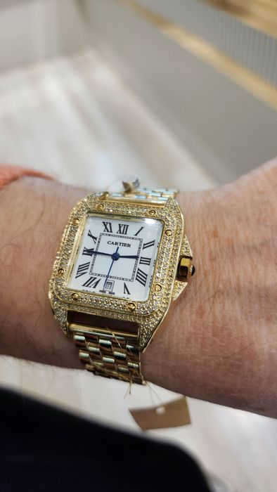 Золотые часы Cartier