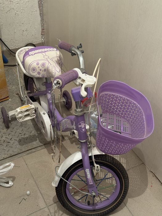 Велосипед сиреневого цвета