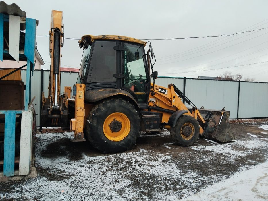 Услуги экскаватора- погрузчика