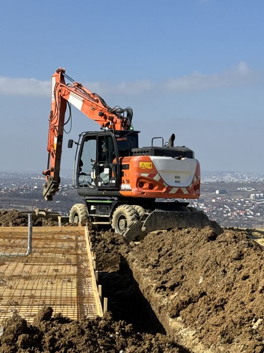 Excavator pe roti hitachi 145w