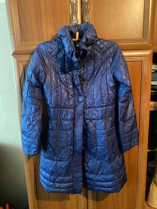 Пуховики и плащи