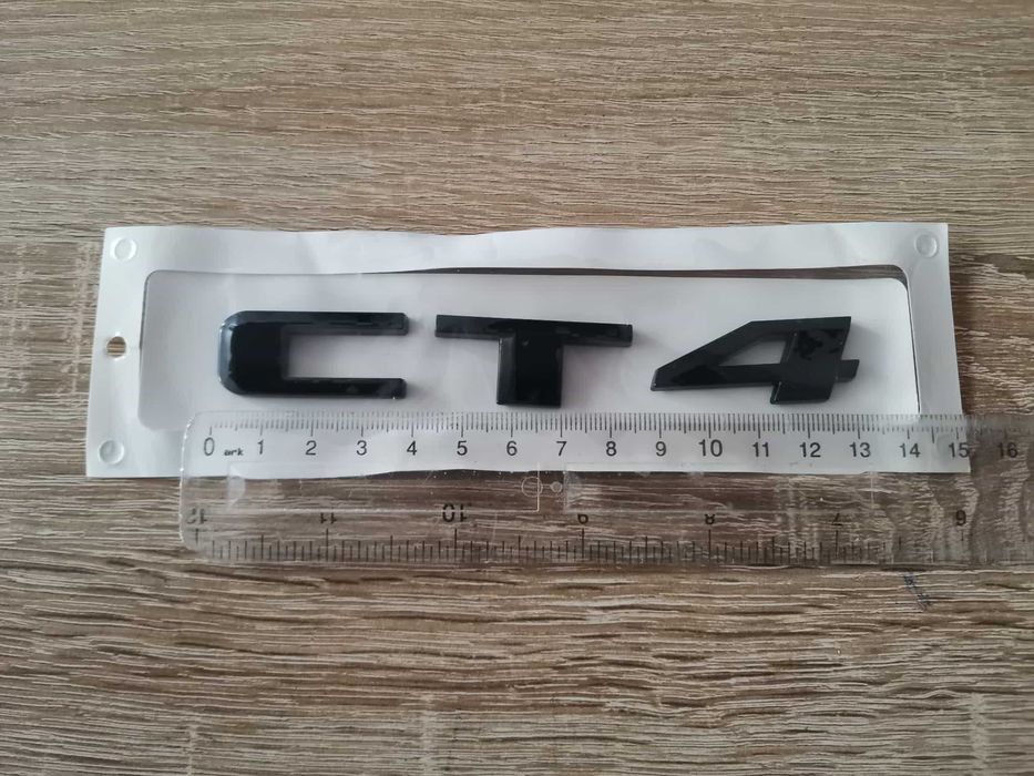черно лого Cadillac CT4