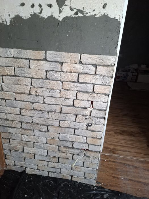 Балконы,кладка кирпича под расшивку.Утепление стен