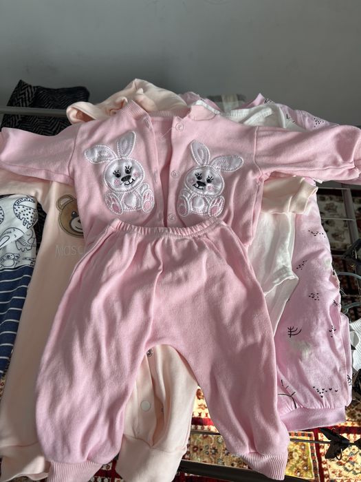 Детская одежда на новорожденного