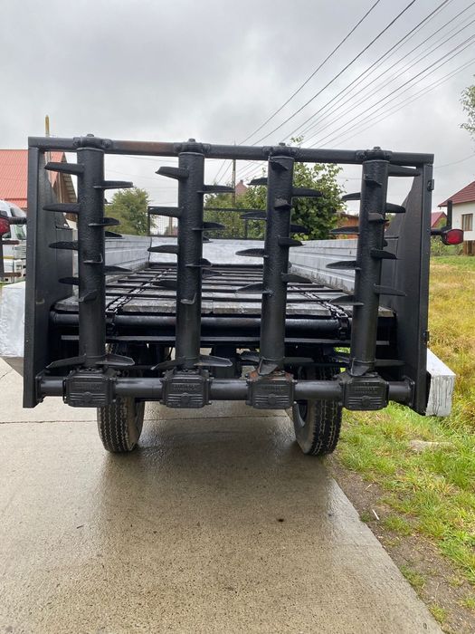 Mig pentru imprastiat gunoi tip remorca