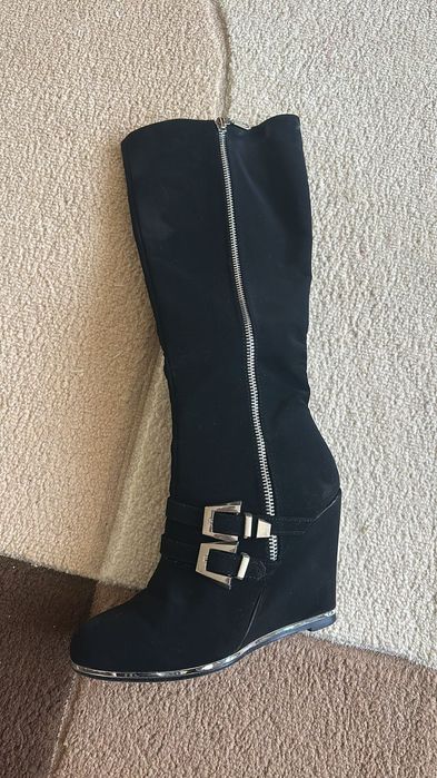 Сапоги на каблуке