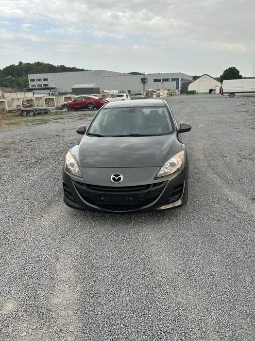 Mazda 3 1,6 benzina 105 cp 2010