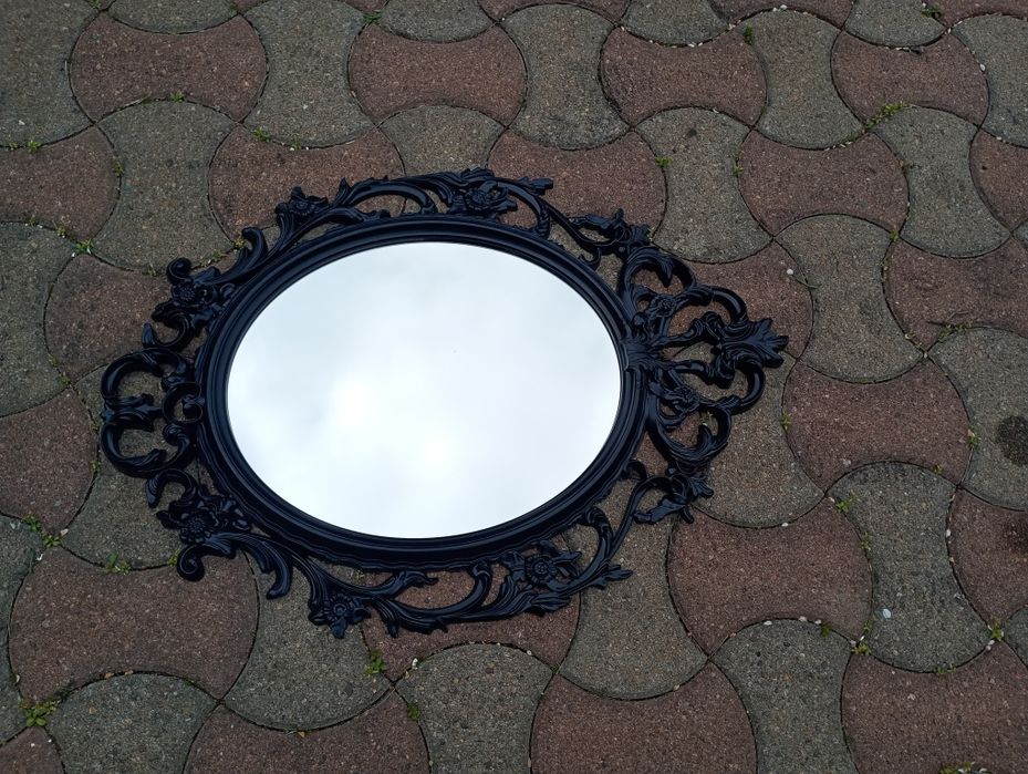 Oglindă ovala cu rama neagra