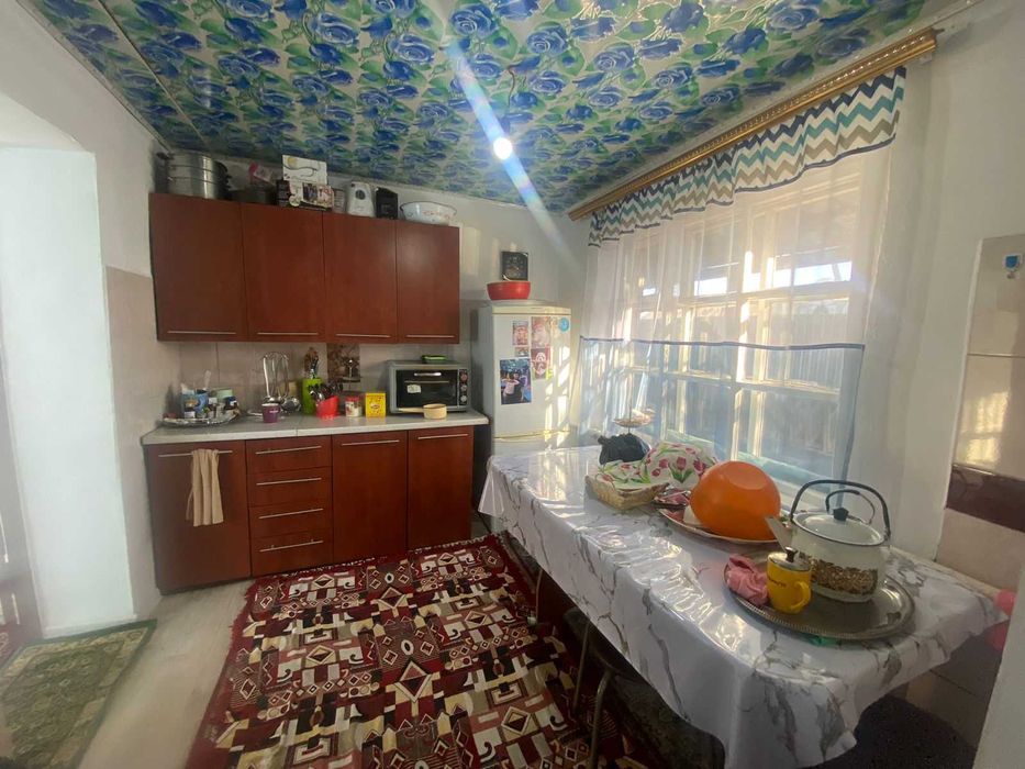 Дом на Бугре, Танат Империя