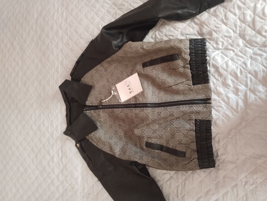 Kurtka yangi kiyilmagan 46 L razmer