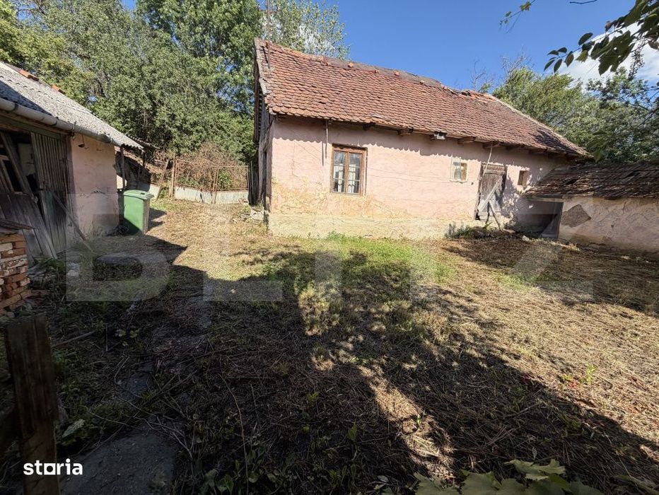 Casa cu 3 camere si un teren in suprafata de 1900 mp