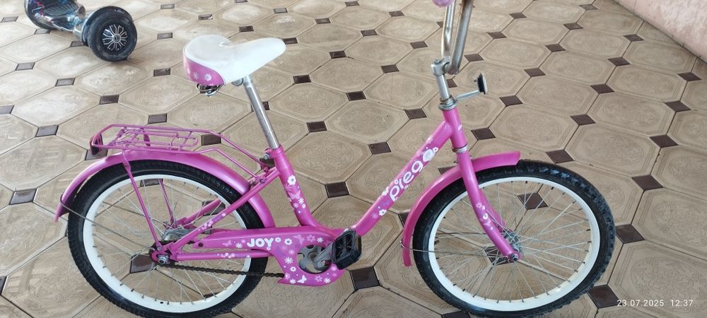 Велосипед розовый