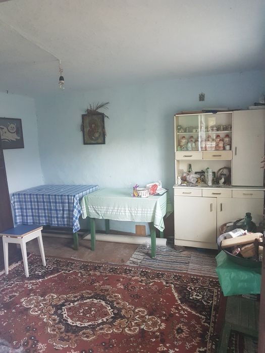 Teren + casa + panouri 7 kW + baterie, zona liniștită