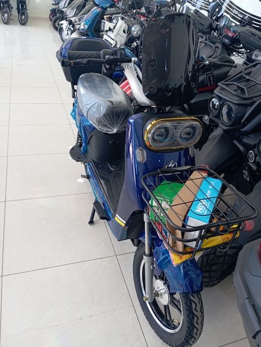 Скутр кваадрацикал