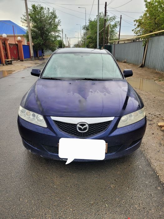 Автомобиль мазда 6