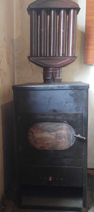 Камина за отопление на дърва