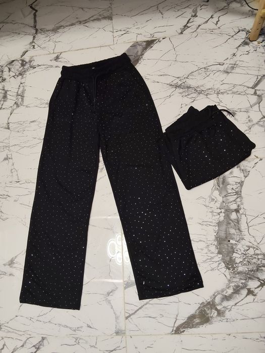 Pantaloni evazați cu pietricele de damă