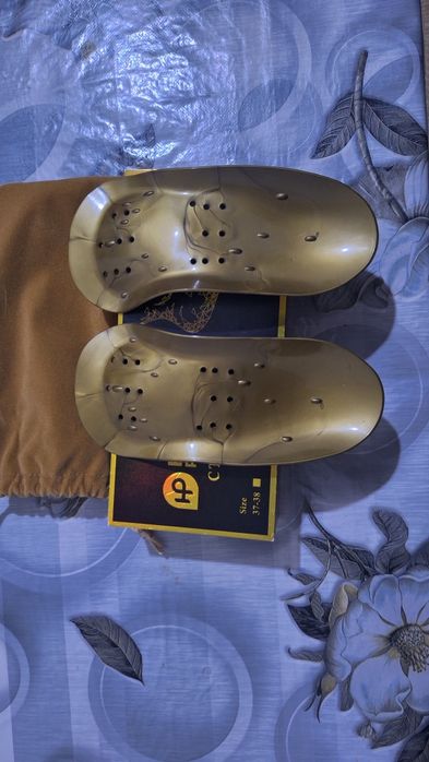 Коррекционные  ортопедические стельки.