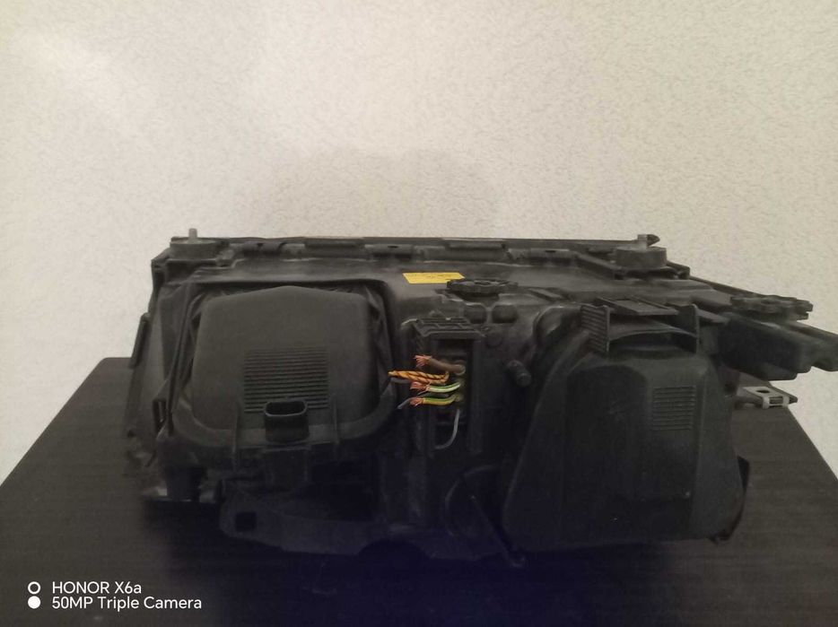 Продам фары на бмв Е38 дорест оригинал BOSH