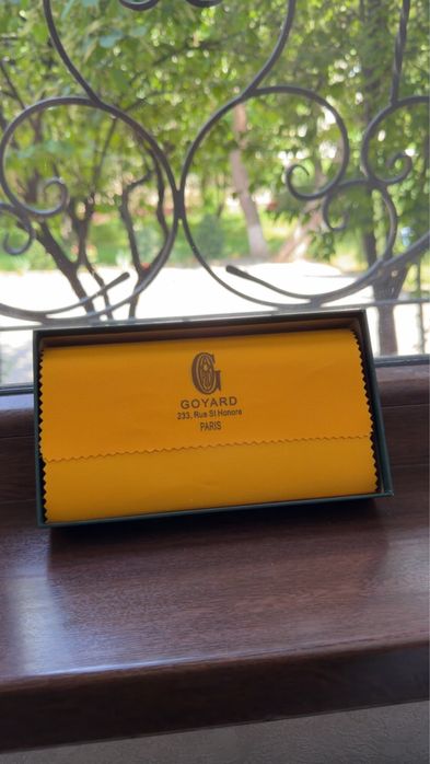 Кошелек Goyard.
