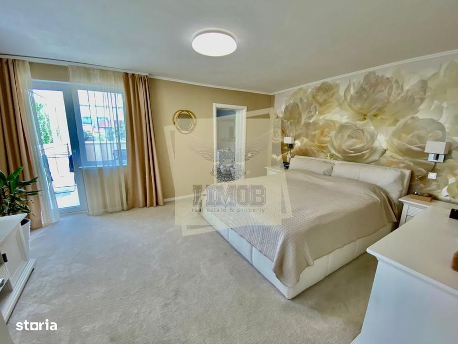 Casa cu 4 camere 3 bai 2 terase si teren 450 mp in zona Parcul Sub Ari