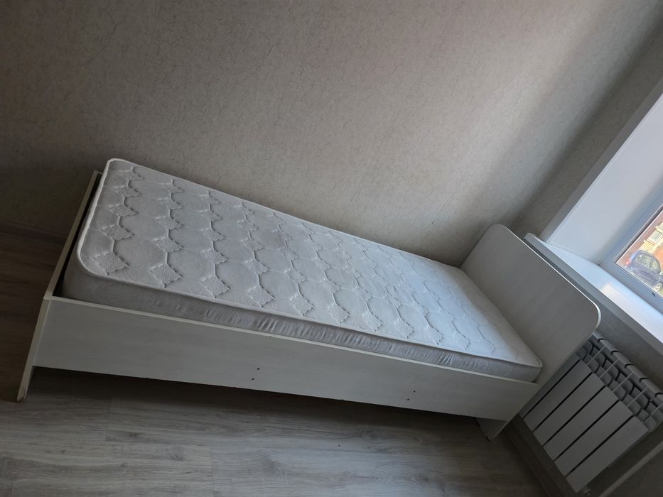 Кровать с раздвижной шкафчиком