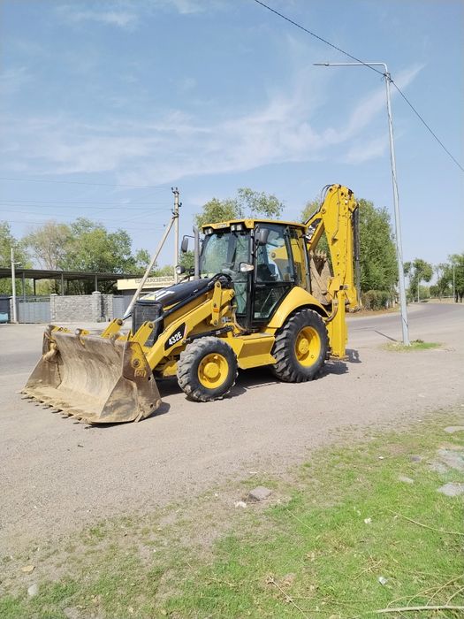 Услуги экскаватора погрузчика 3в1 трактор эксковатор аренда