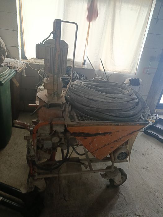 Mașină de tencuit tip Mac 97