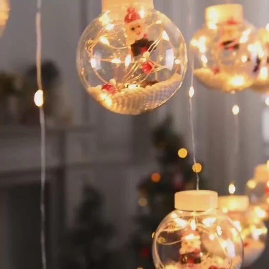 Светещ коледен гирлянд с рингове и малки коледни фигурки