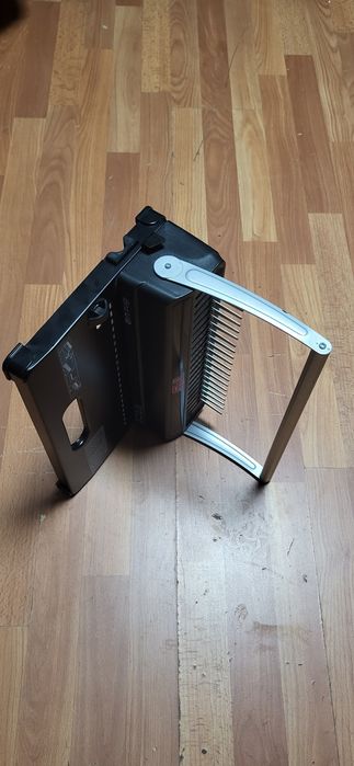 Aparat de indosariat cu inele / spire de plastic