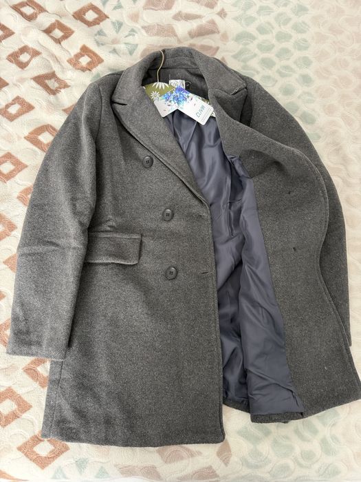 Palton nou ci eticheta