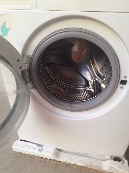 Стиральная машинка Артел.