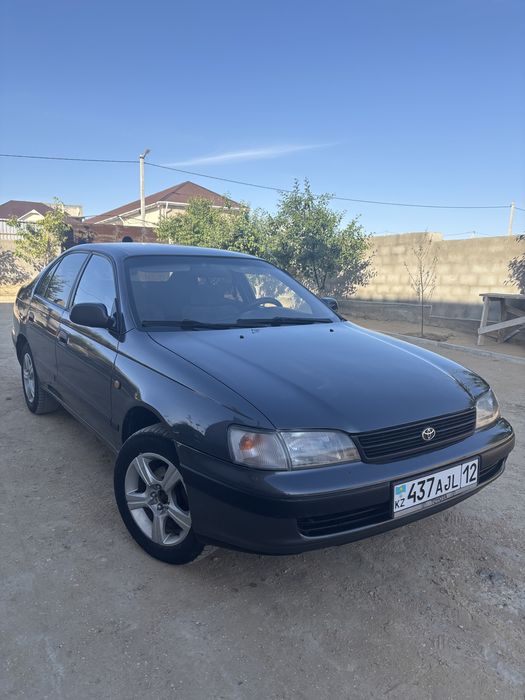 Тойота карина Е
