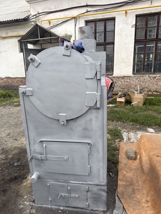 Продам котел на твердом топливе