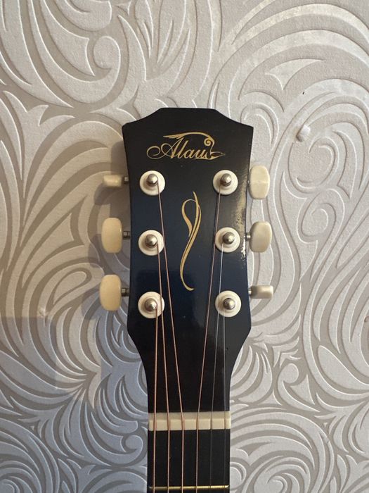 Гитара инструмент